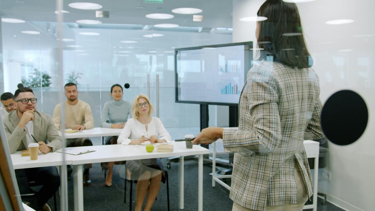 A facilitator leading a session with a seated group